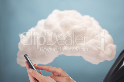 Businesswoman connecting phone to cloud computing