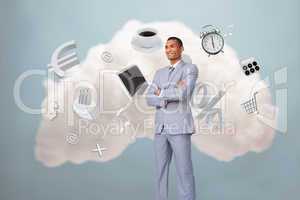 Businessman standing with cloud computing symbol