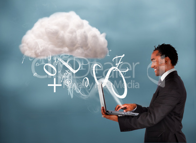 Businessman using laptop to connect to cloud computing