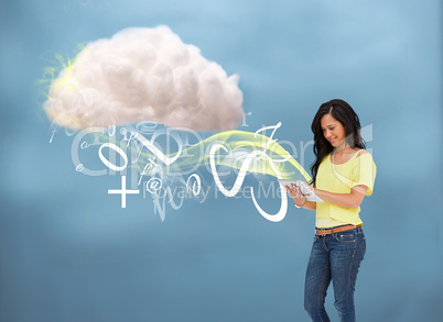 Casual girl using tablet to connect to cloud computing