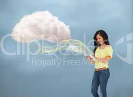 Casual girl using tablet to connect to cloud computing