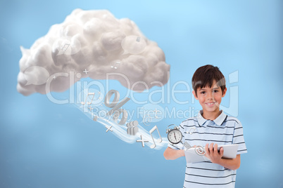 Cute boy using tablet to connect to cloud computing