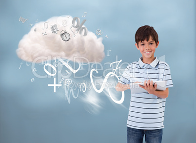Young boy using tablet to connect to cloud computing