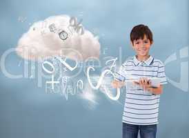 Young boy using tablet to connect to cloud computing