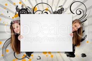 Pretty girls holding blank advertisement space