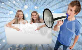 Pretty girls pointing to blank card with young man shouting thro