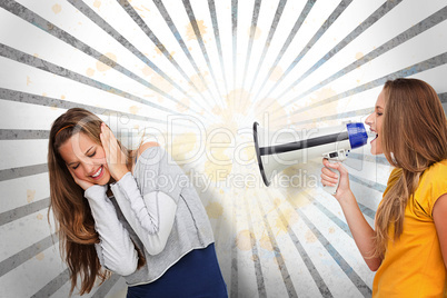 Girl shouting at her friend through megaphone