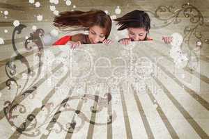 Girls looking down on copy space on art deco style background