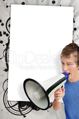 Young man shouting through megaphone in front of copy space