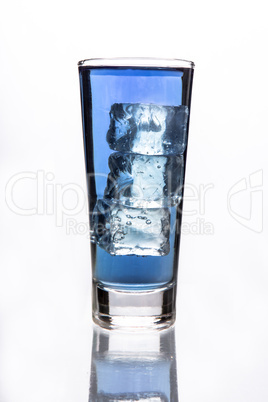 Glass of water with three ice cubes