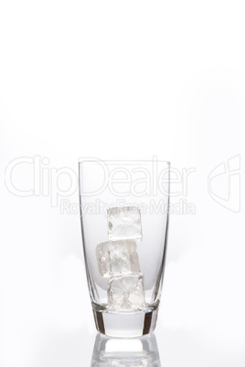 Empty glass with ice cubes