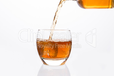 Whisky  bottle pouring into glass