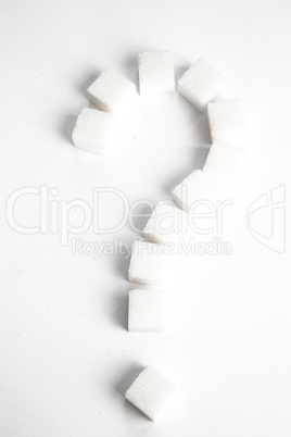 Sugar cubes in shape of question mark