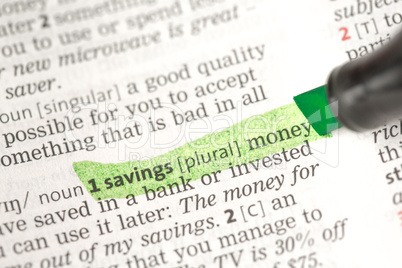 Savings money definition highlighted in green