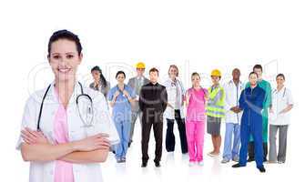 Doctor standing in front of different types of workers