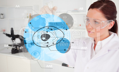 Chemist examining cell interface