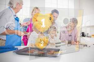 Extended family baking together with futuristic interface