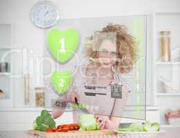 Smiling woman making salad using hologram interface