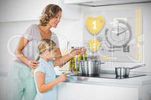 Mother and daughter making dinner using futuristic interface