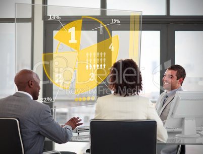 Business people using yellow pie chart interface