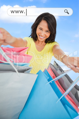 Woman showing her shopping bags under address bar