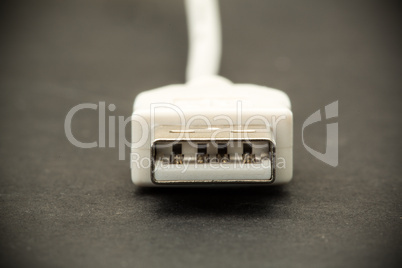 Close up of tip of white USB