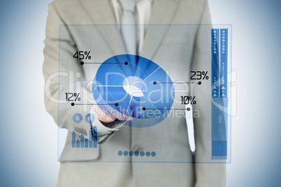 Standing businessman using blue pie chart interface