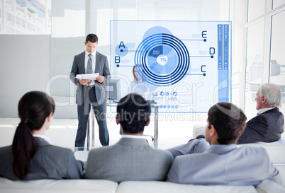 Business people listening and looking at blue diagram interface