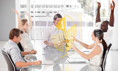 Cheerful business workers using yellow pie chart interface