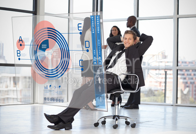 Confident businessman looking at blue diagram interface