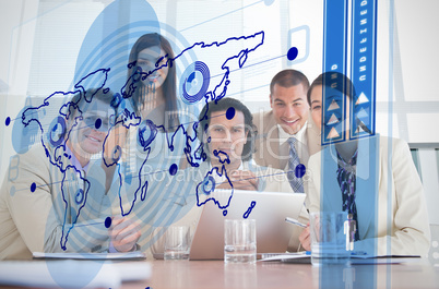 Smiling business workers looking at blue map interface