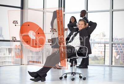 Confident businessman looking at pie chart interface