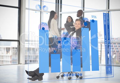 Confident businessman looking at futuristic chart interface