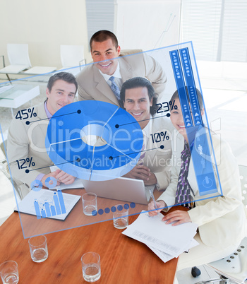 Overview of happy colleagues looking at blue chart interface