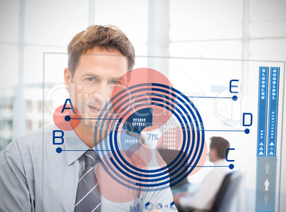 Businessman looking at blue diagram interface