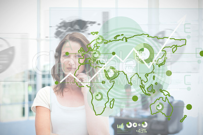 Blonde businesswoman using green map interface