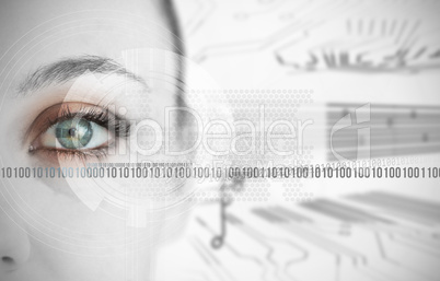 Eye of woman next to binary codes close up