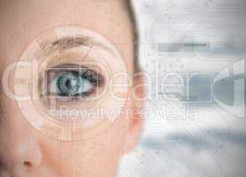 Close up of woman eye analyzing charts