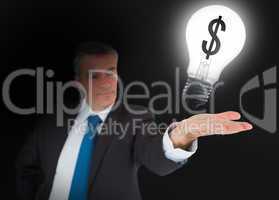 Businessman showing light bulb