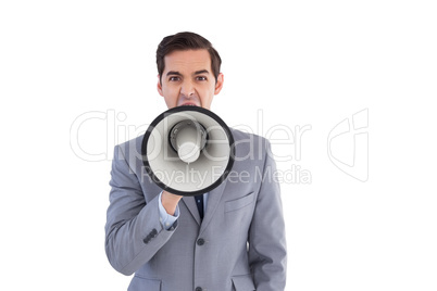 Businessman shouting into a megaphone