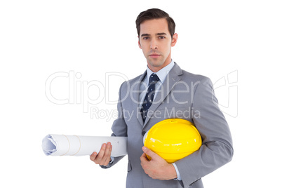 Architect holding plans and hard hat