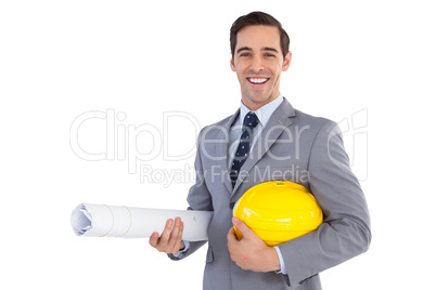 Happy architect holding plans and hard hat
