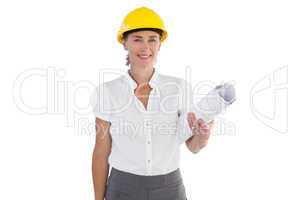 Female architect holding plans and hard hat