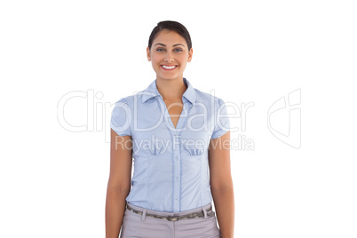 Smiling businesswoman standing alone