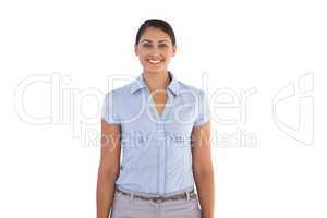 Smiling businesswoman standing alone
