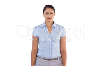 Young businesswoman standing alone