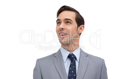 Smiling businessman looking away