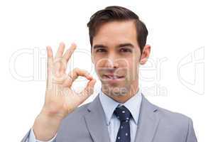 Businessman giving ok sign