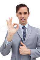 Smiling businessman showing ok sign