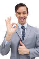 Cheerful businessman showing ok sign